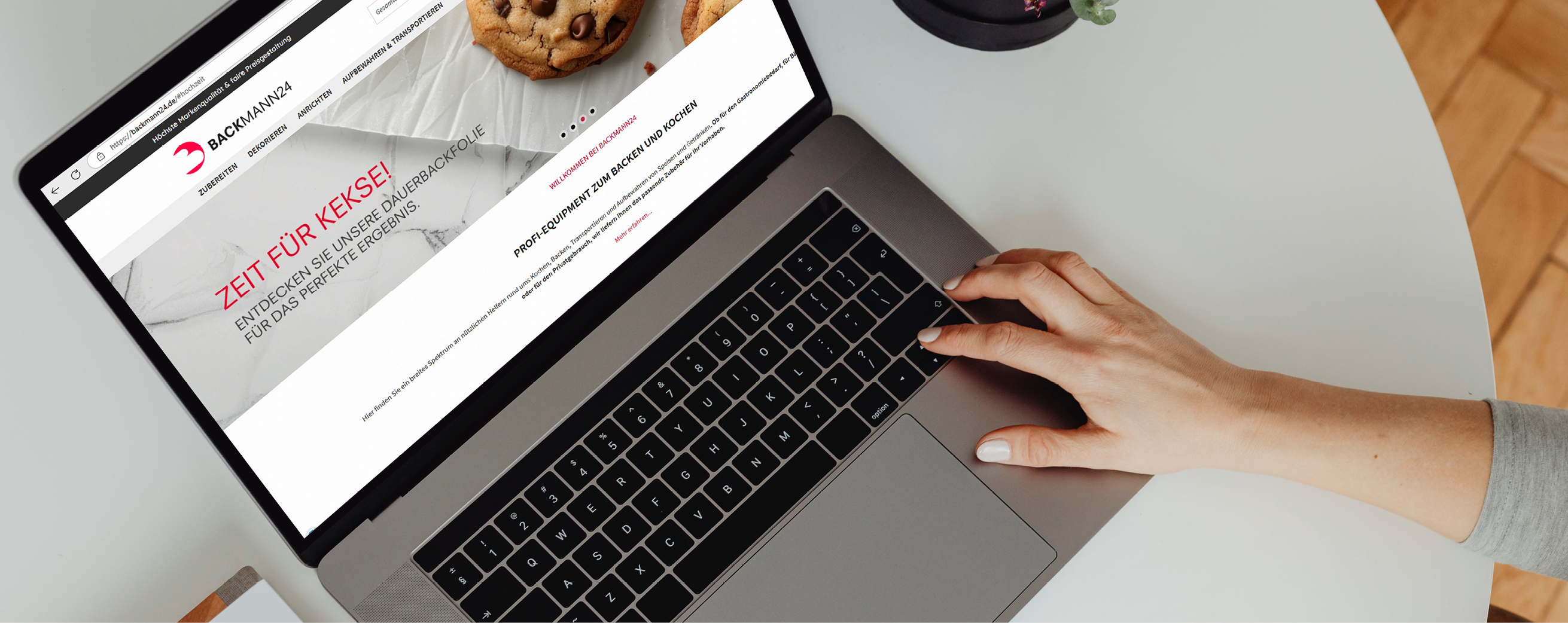 Backmann24 landingpage on laptop screen